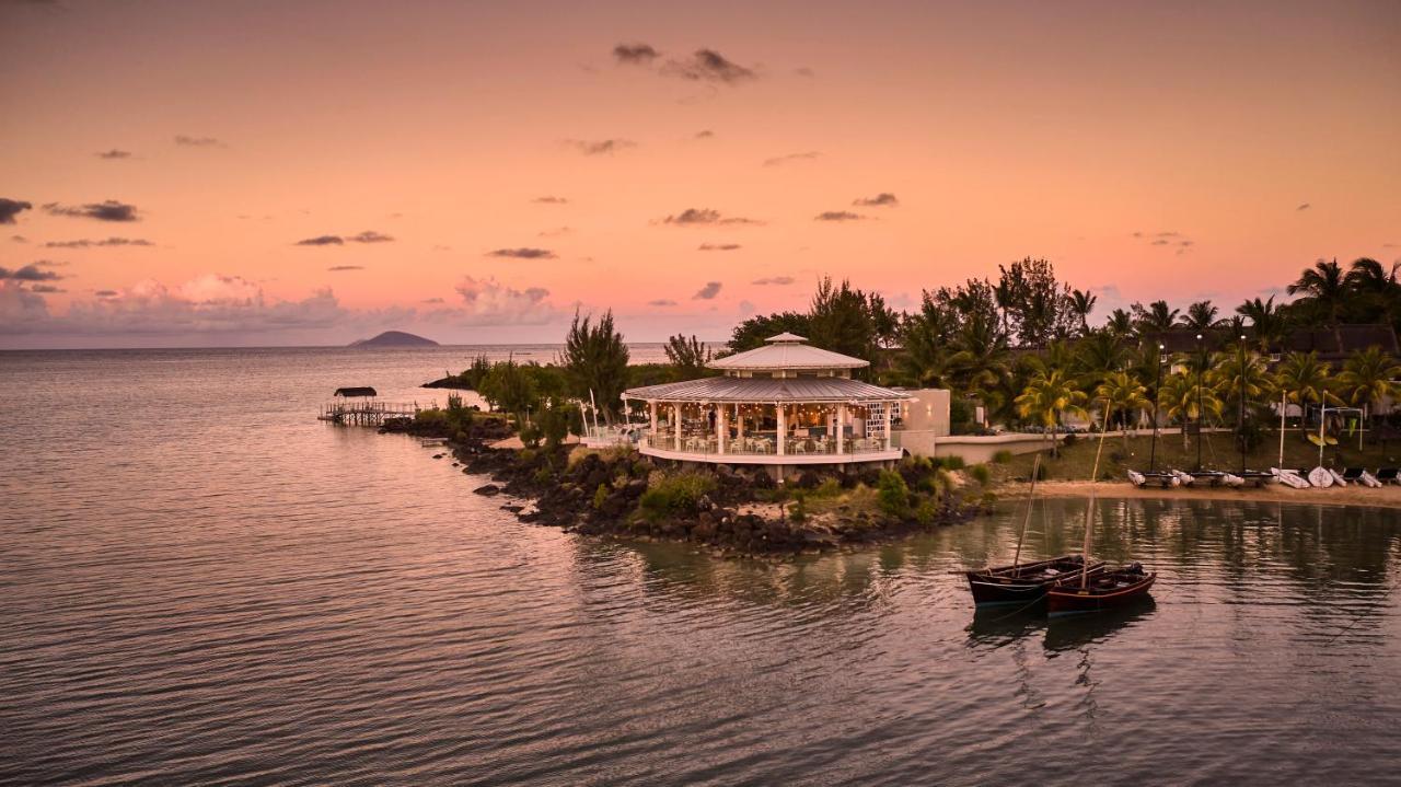 Lux* Grand Gaube Resort & Villas Ngoại thất bức ảnh Sunset at the Atlantis Paradise Island