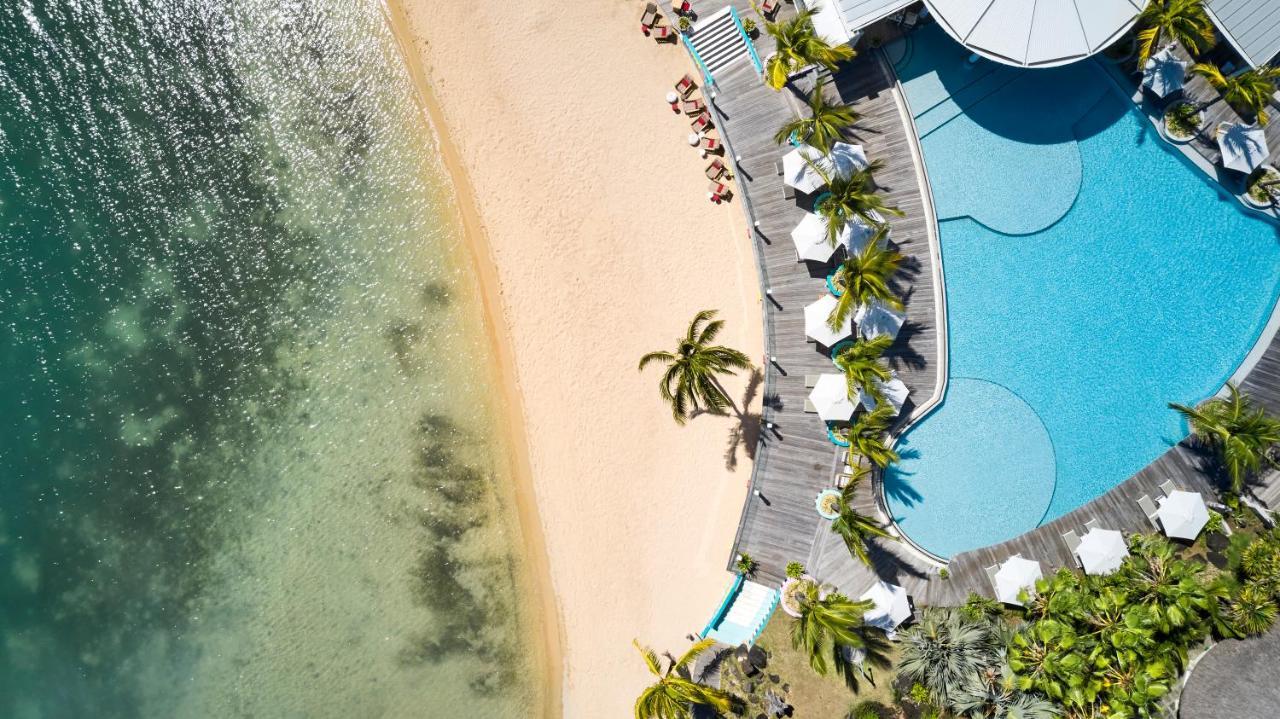 Lux* Grand Gaube Resort & Villas Ngoại thất bức ảnh Aerial view of the pool and beach at the Sheraton Maldives Resort & Spa